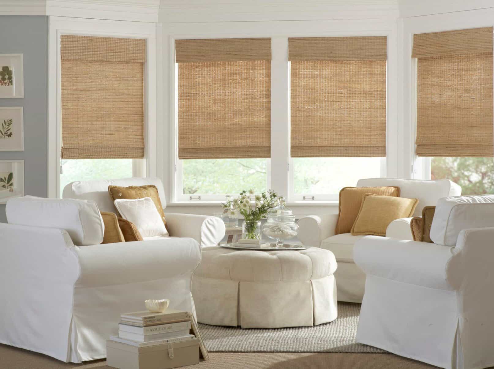 white chairs in a living room with tan bamboo blinds