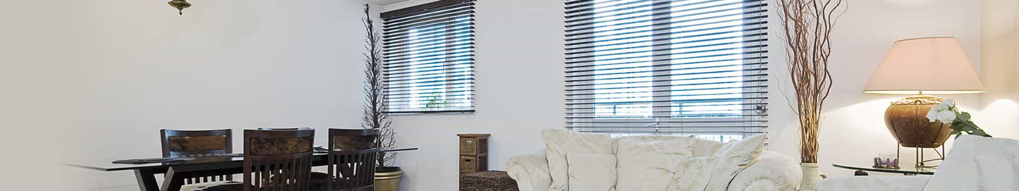 custom blinds in a living & dining area