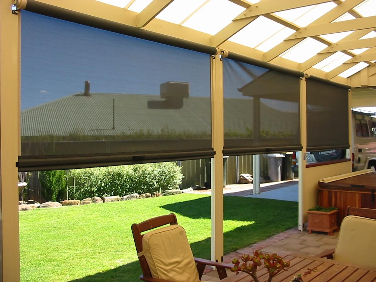 Exterior shades covering a back patio in San Antonio
