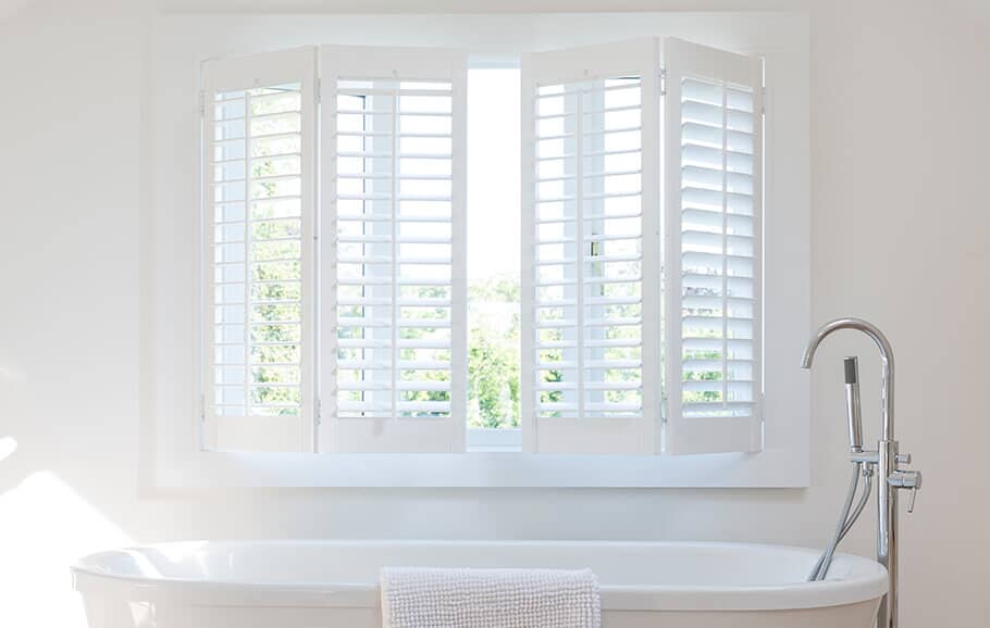 Repaired plantation shutters in Tucson bathroom