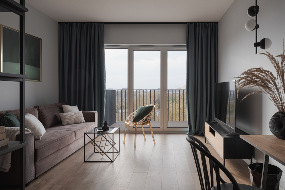 balcony doors with dark curtains