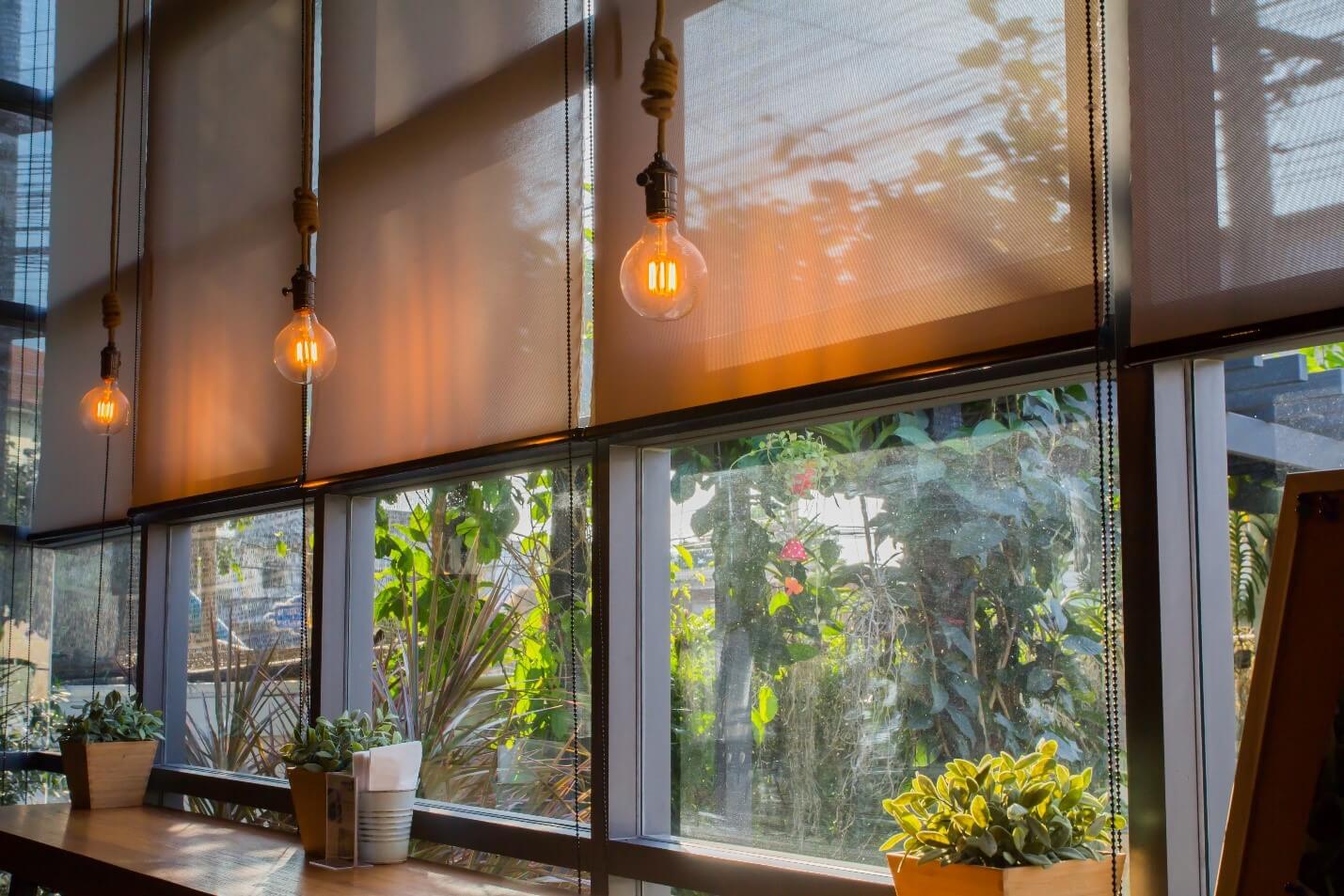 Simple roller shades make for a clean, stylish look.
